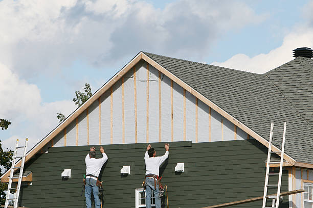 Professional Siding Contractor technician working in Herndon, VA